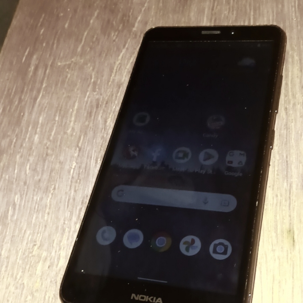 Used Nokia simple mobile phone open and setup ready to use.